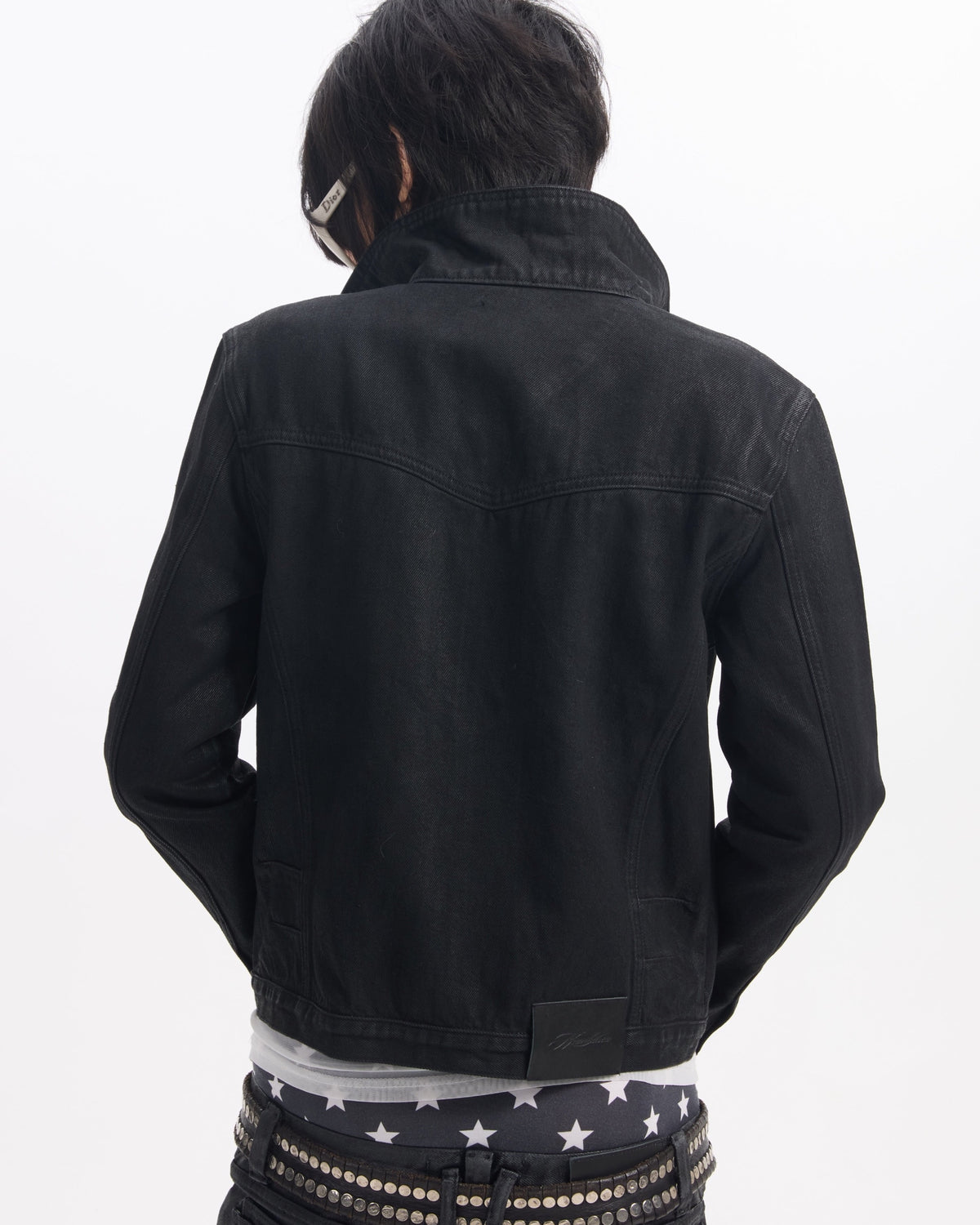 TYPE SWAG Waxed Cropped Denim Jacket by NUMBASIA, on a model