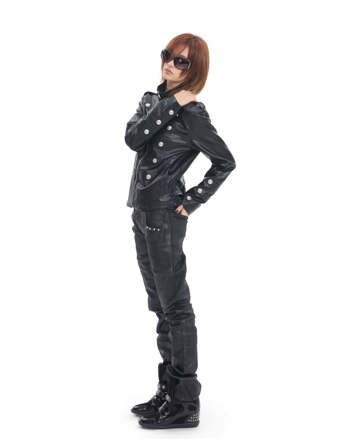 Waxed Studded Low-Rise Flared Jeans by NUMBASIA, on a model