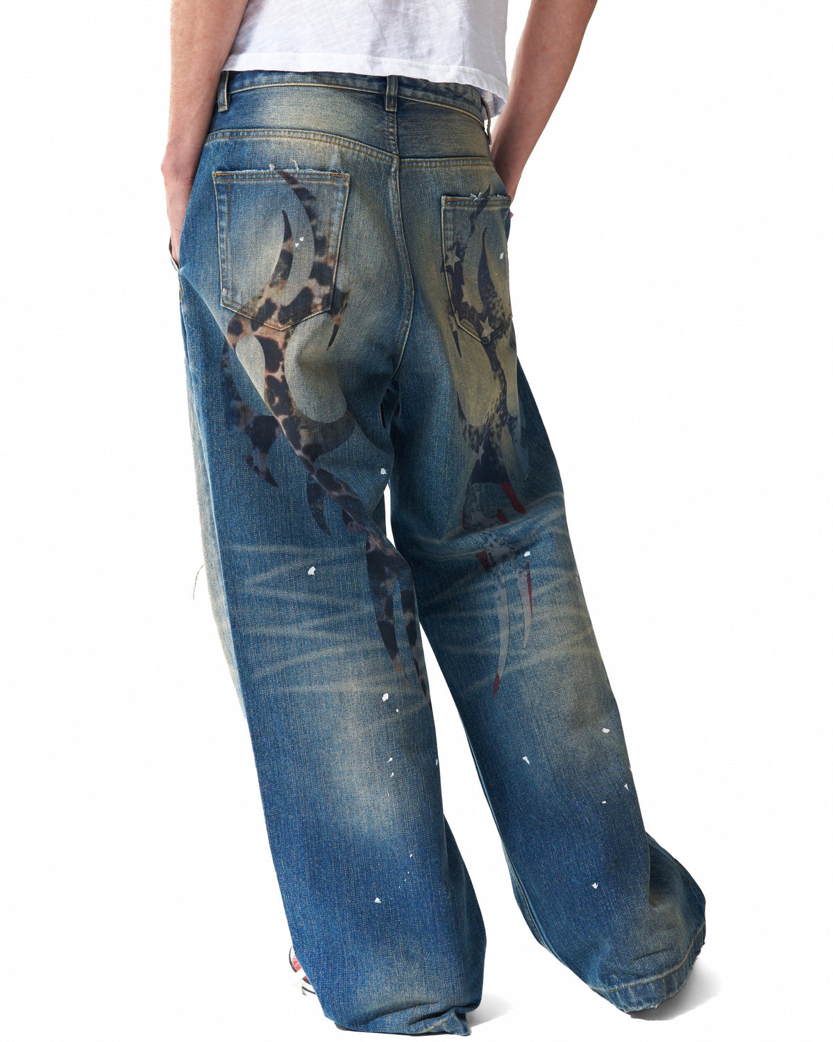 Distressed Leopard Flag Patch 13oz Baggy Jeans by NUMBASIA, on a model