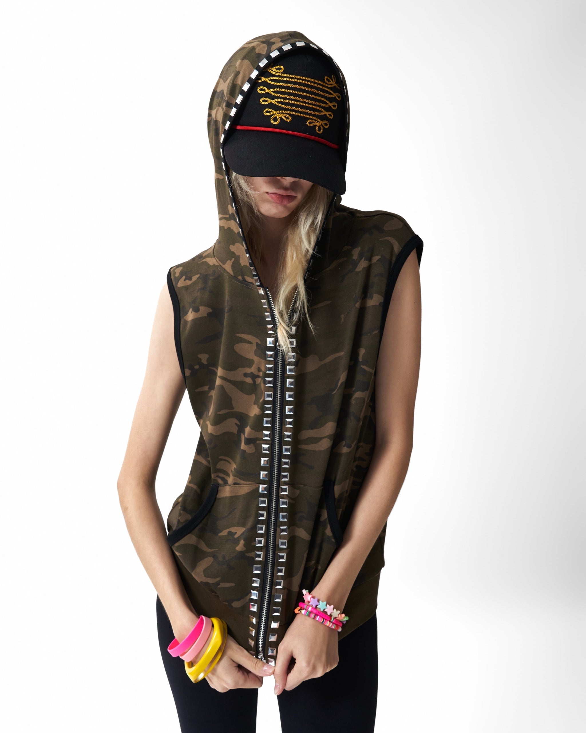 Studded Camo Hooded Zip Vest by NUMBASIA, on a model