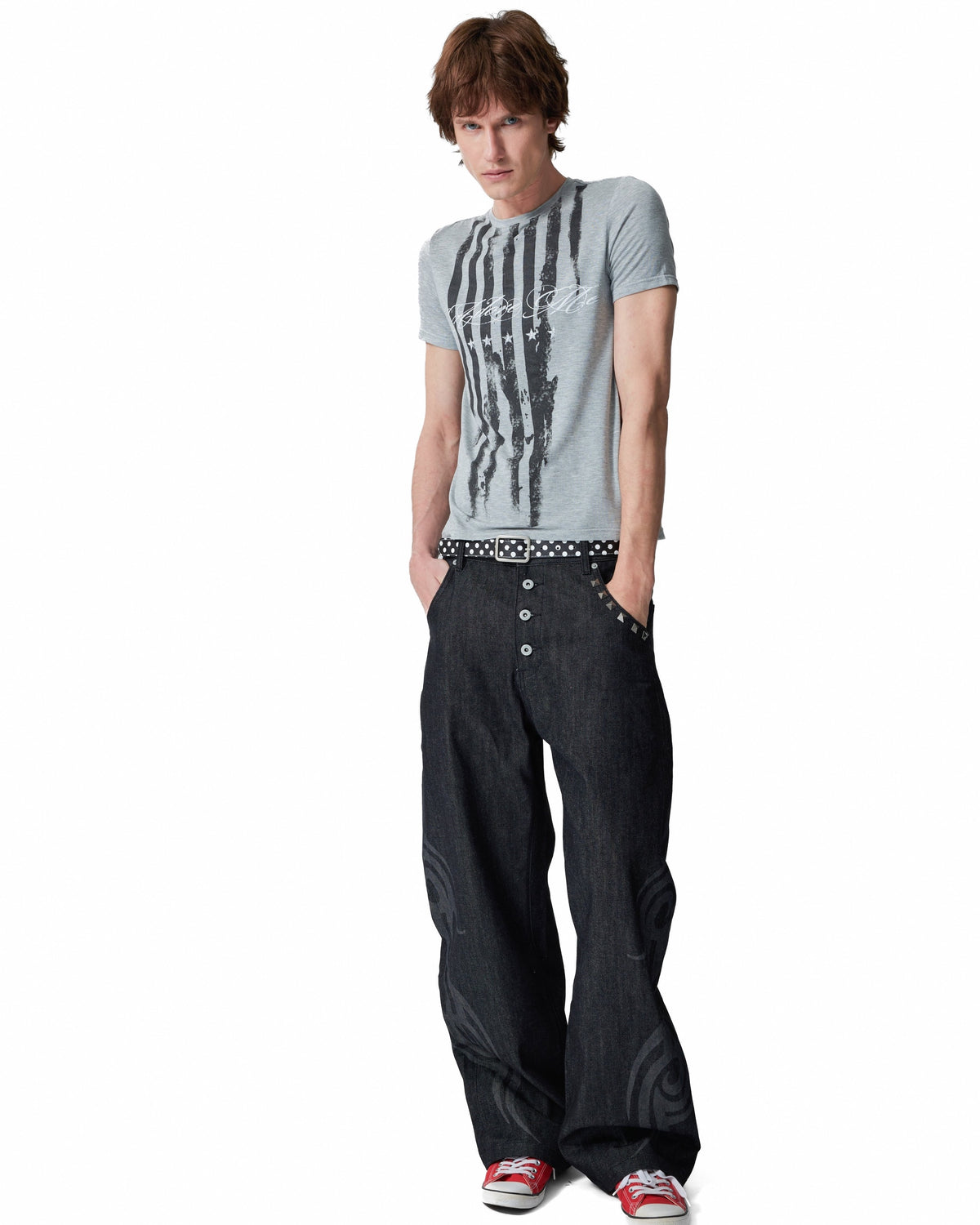 Burnout Motif Studded 13oz Baggy Raw Denim Jeans by NUMBASIA, on a model