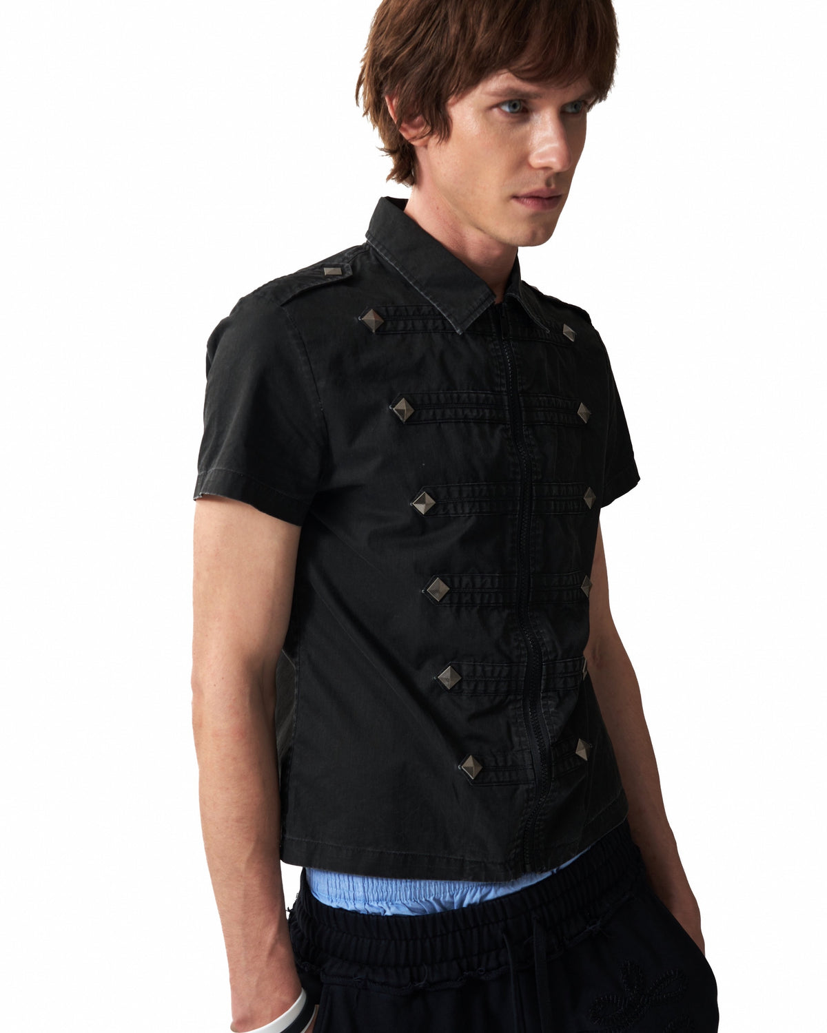 Studded Epaulette Zip-Front Short Sleeve Shirt by NUMBASIA, on a model