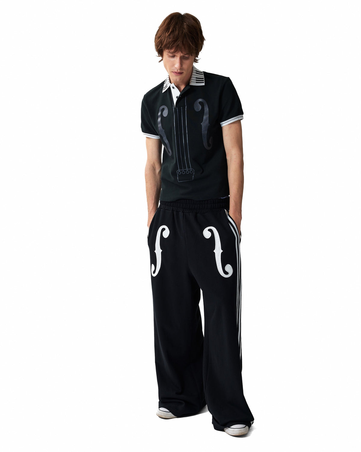 Violin Applique Striped Wide-Leg Sweatpants by NUMBASIA, on a model
