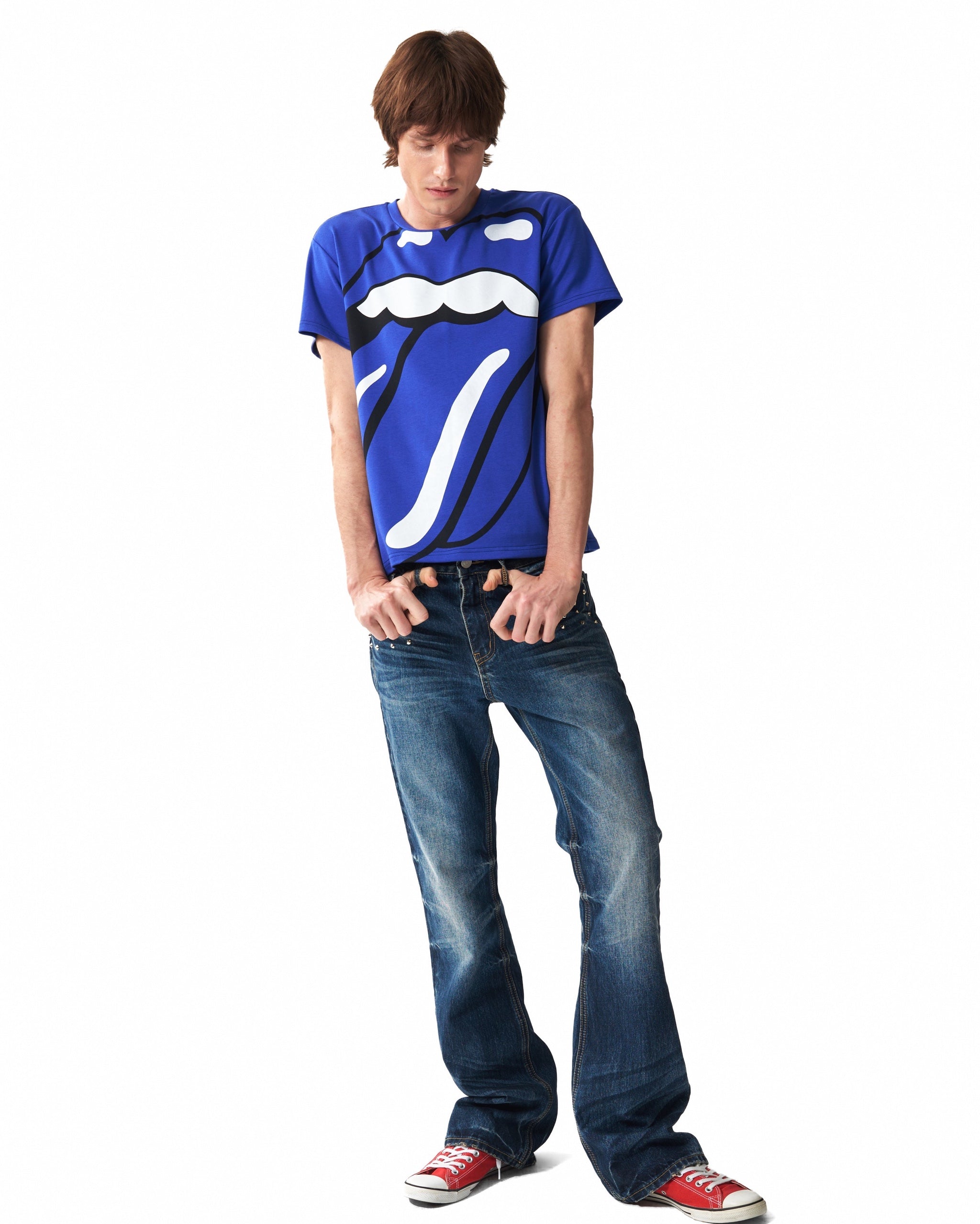 Spike-Studded Washed Flared Jeans by NUMBASIA, on a model