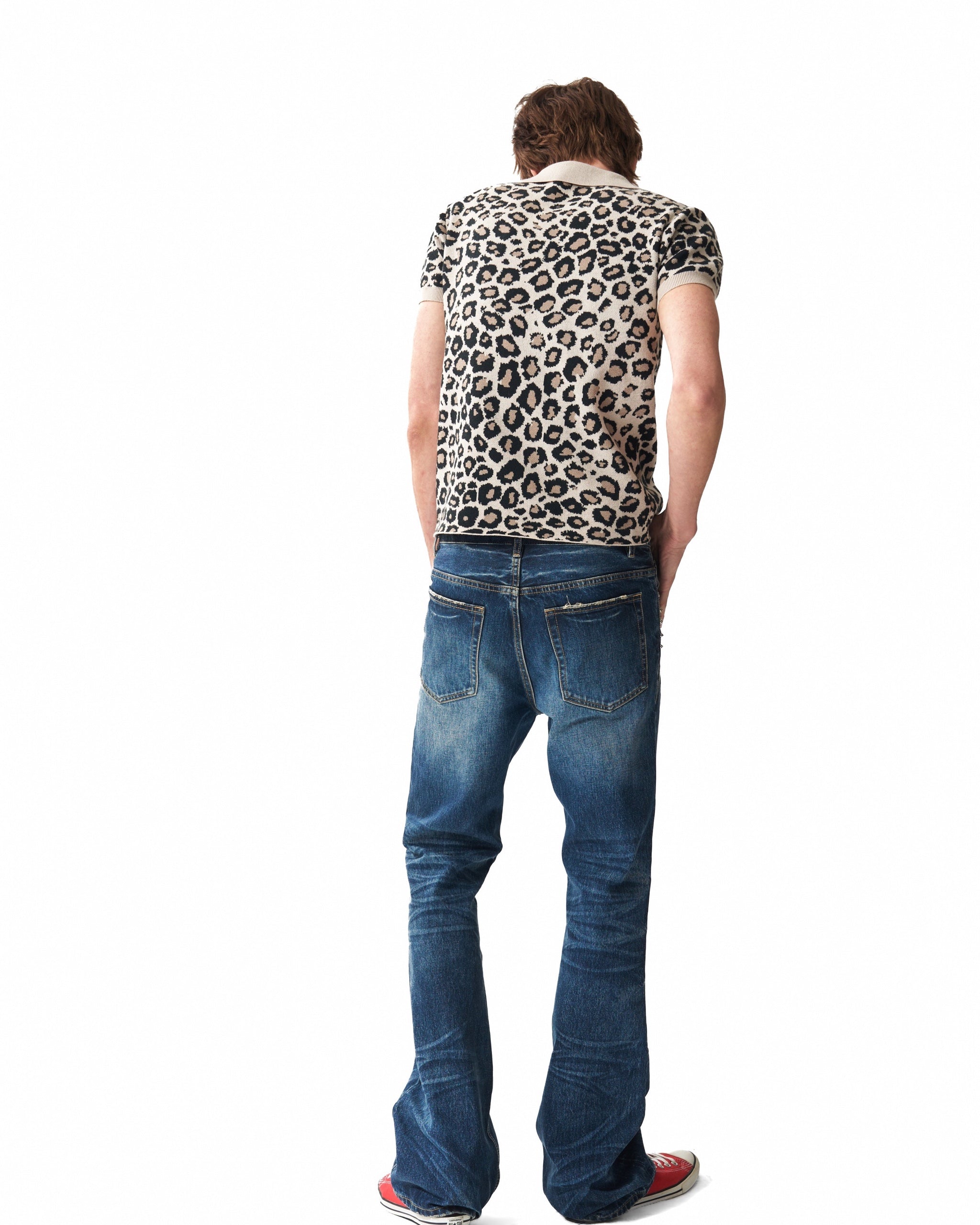 PARTYBOY Leopard Jacquard Knit Polo by NUMBASIA, on a model