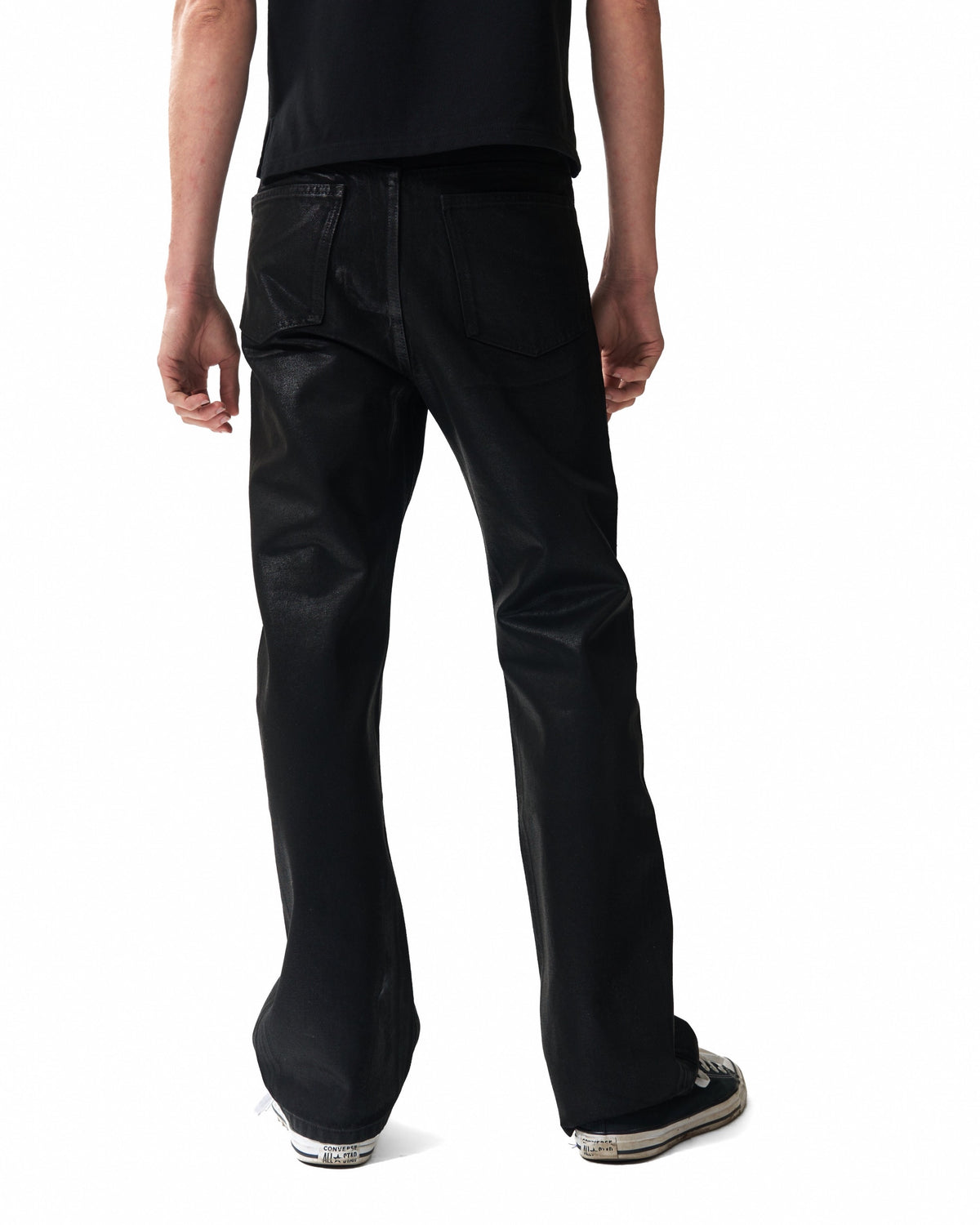 Wax-Coated 13oz Slim Flared Jeans by NUMBASIA, on a model
