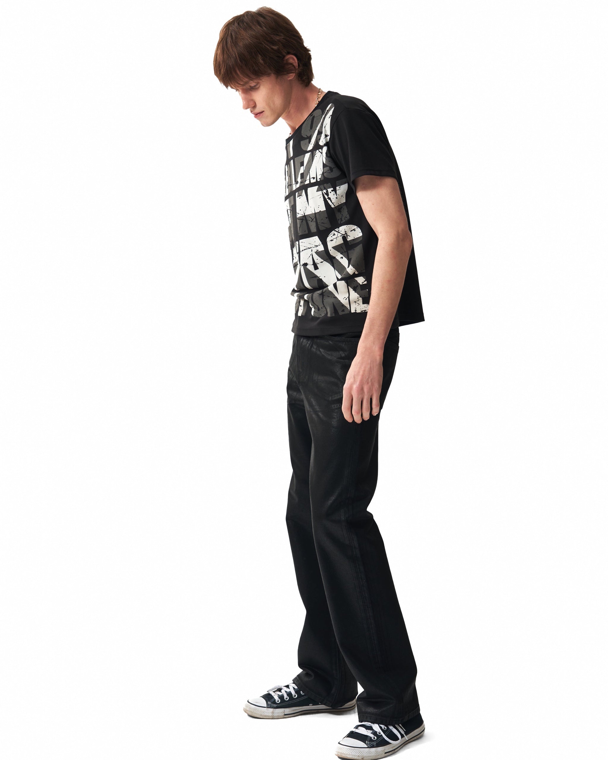 Wax-Coated 13oz Slim Flared Jeans by NUMBASIA, on a model