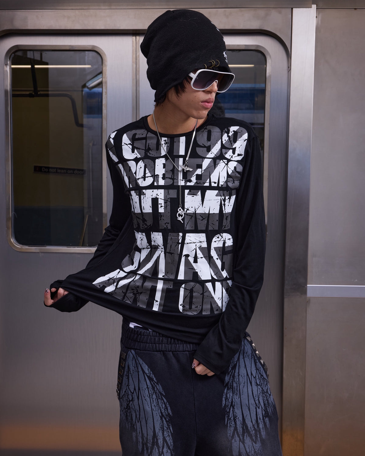 SWAGLIFE Flag Graphic Long Sleeve T-Shirt by NUMBASIA, on a model