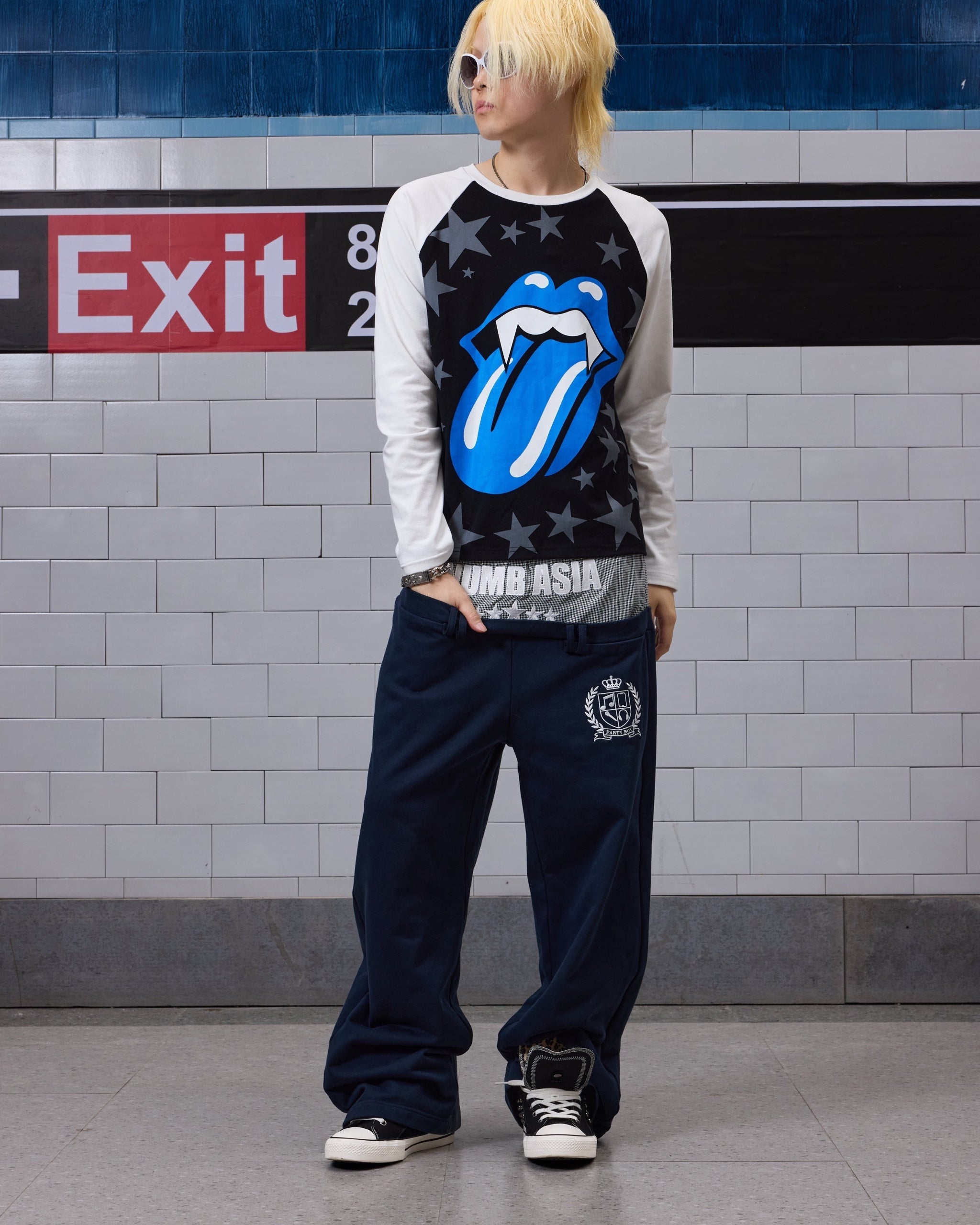 Star Embroidered Double-Waist Baggy Sweatpants by NUMBASIA, on a model