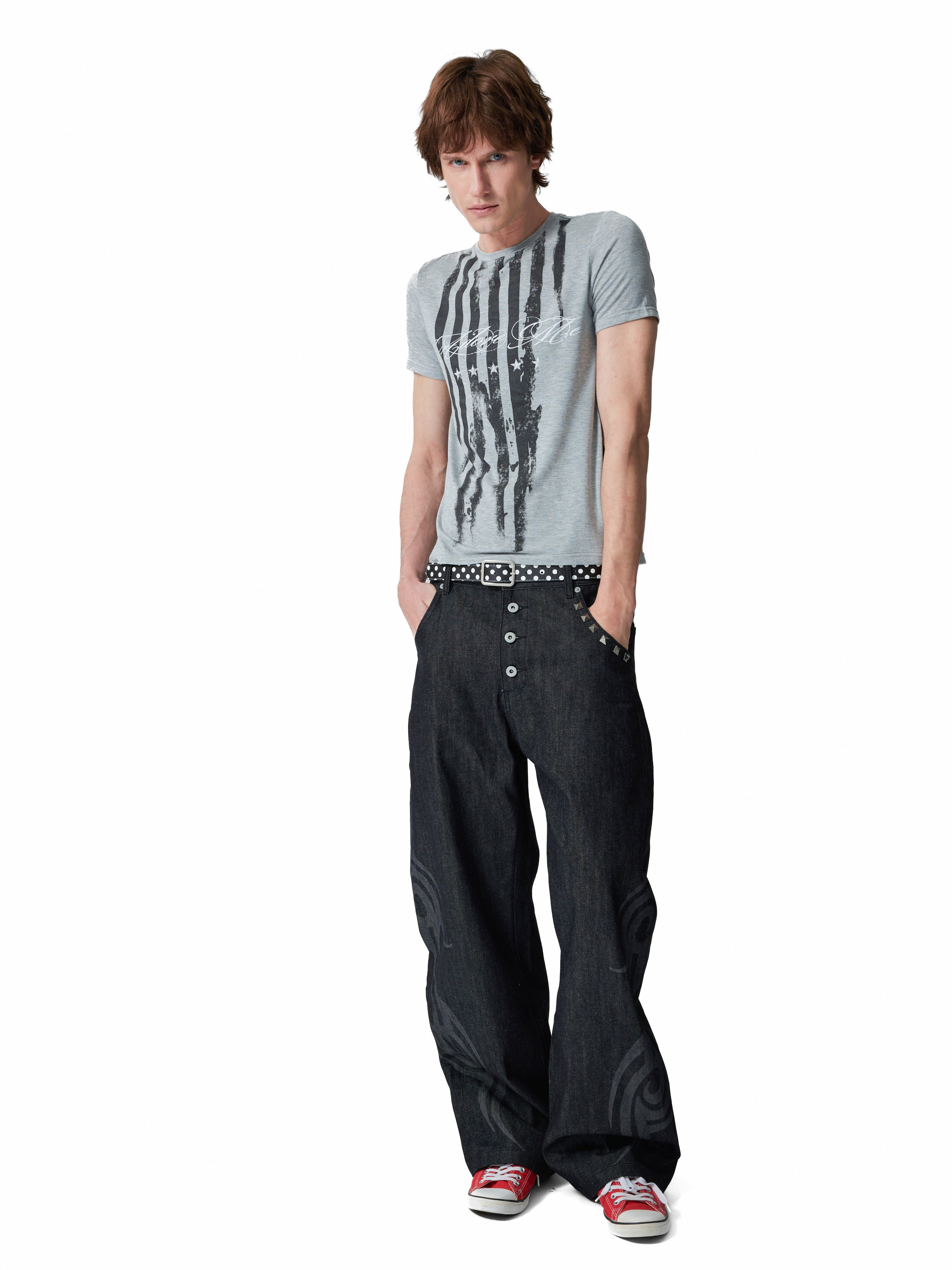 NUMBASIA Burnout Motif Studded 13oz Baggy Raw Denim Jeans — studio model view 1