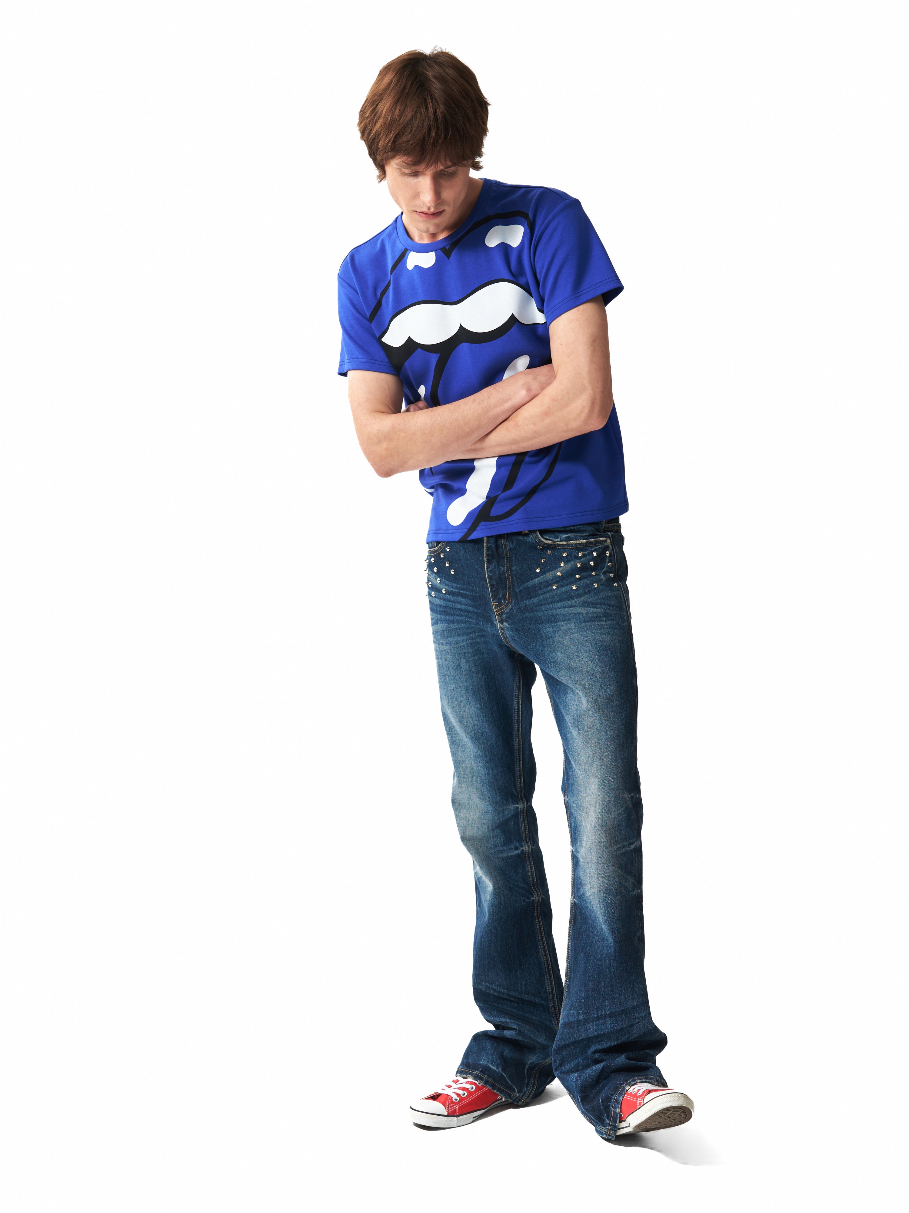 NUMBASIA Spike-Studded Washed Flared Jeans — studio model view 2