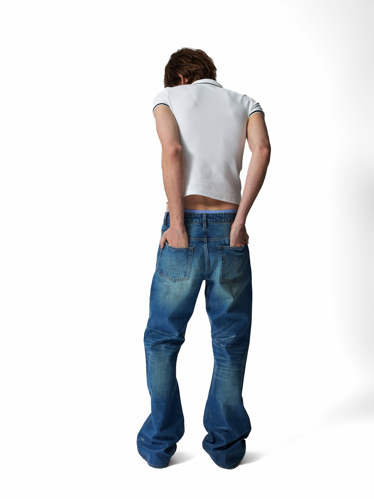 NUMBASIA Skins Portrait Embroidered Polo — studio model view 2