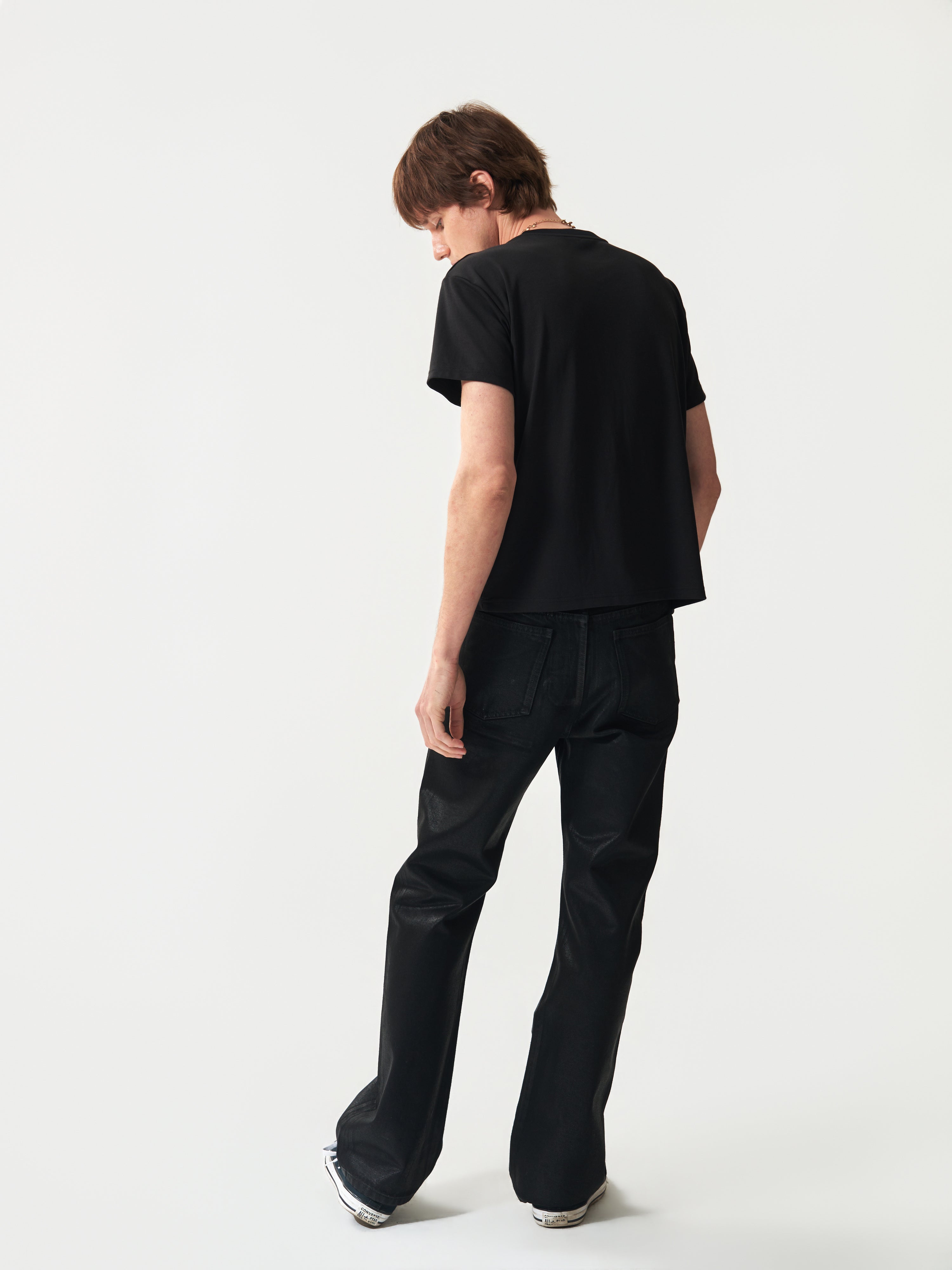 NUMBASIA Wax-Coated 13oz Slim Flared Jeans — studio model view 5